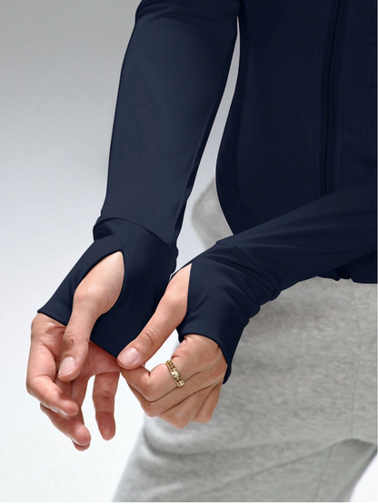 CHAQUETA DEPORTIVA MOLDEADORA AL CUERPO