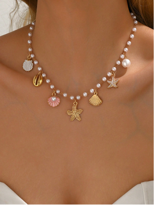 COLLAR CON DIJES Y PERLAS DE MAR