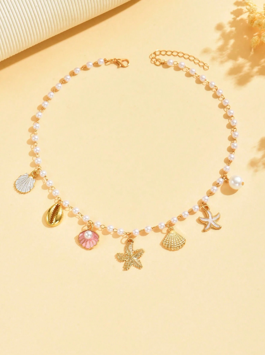 COLLAR CON DIJES Y PERLAS DE MAR